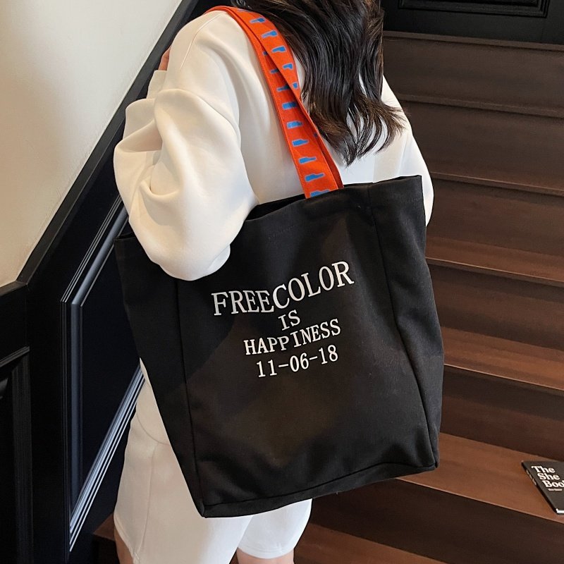 字母帆布包包女大容量学生上课通勤手提袋秋冬小众百搭单肩托特包,淘宝优惠券,粉丝福利购,淘宝优惠卷