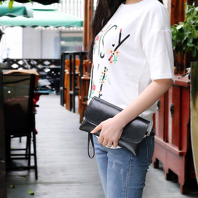 新款韩版热销潮流洋气牛皮轻便手包 qger青歌女士包袋