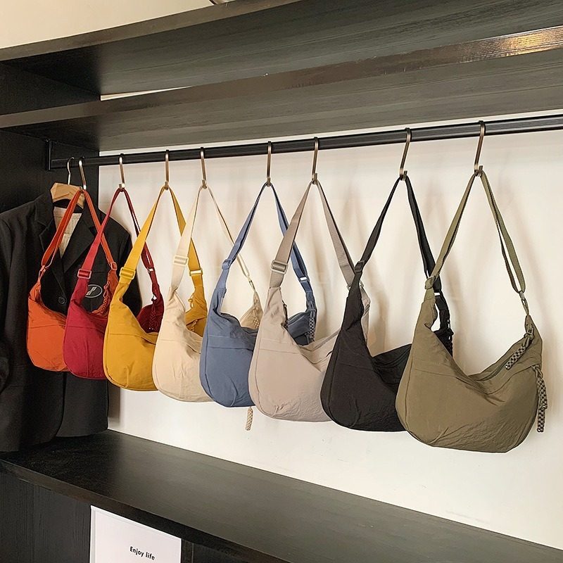 斜挎饺子包女新款轻便休闲时尚斜跨热销女包包韩国小众通勤单肩包,淘宝优惠券,粉丝福利购,淘宝优惠卷