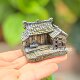 Mini country old house with tile roof and farmhouse courtyard decorations