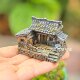 Mini country old house with tile roof and farmhouse courtyard decorations