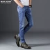 Mùa xuân và hè hè 2018 skinny cotton cotton jeans nam phiên bản Hàn Quốc của xu hướng quần skinny chân mèo phải trắng - Quần jean