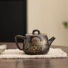 Kung Fu tea set gold and silver mixed with black lion dance ball