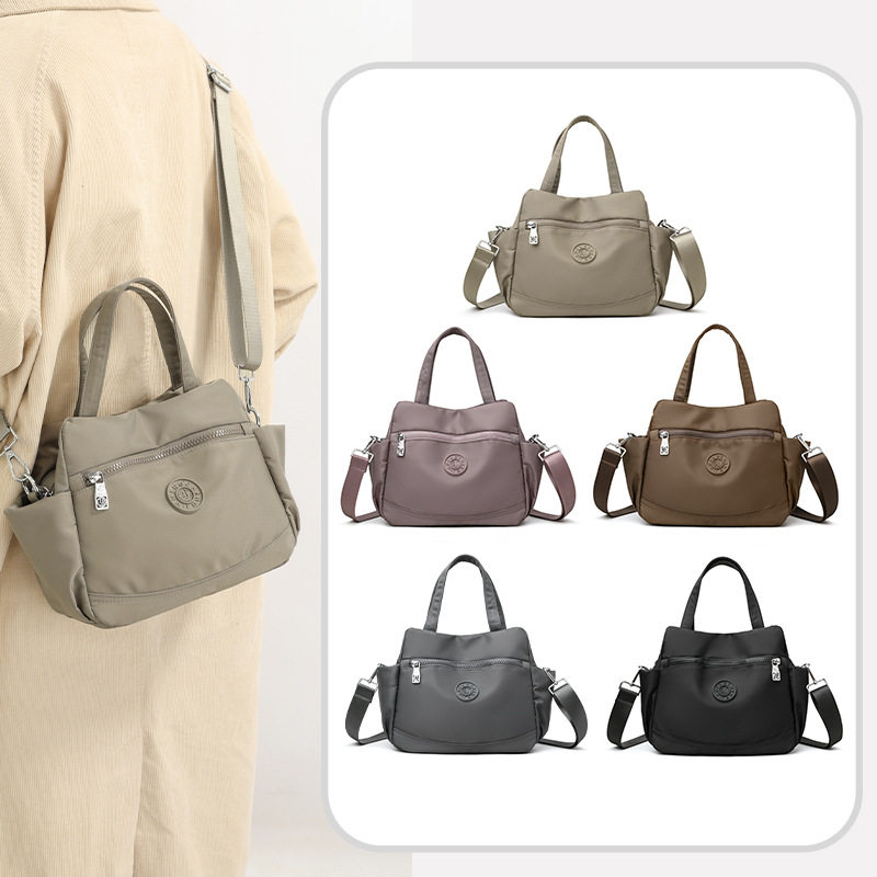 2026新款单肩斜挎包女大容量多口袋牛津帆布通勤上班杂物手提小包,淘宝优惠券,粉丝福利购,淘宝优惠卷