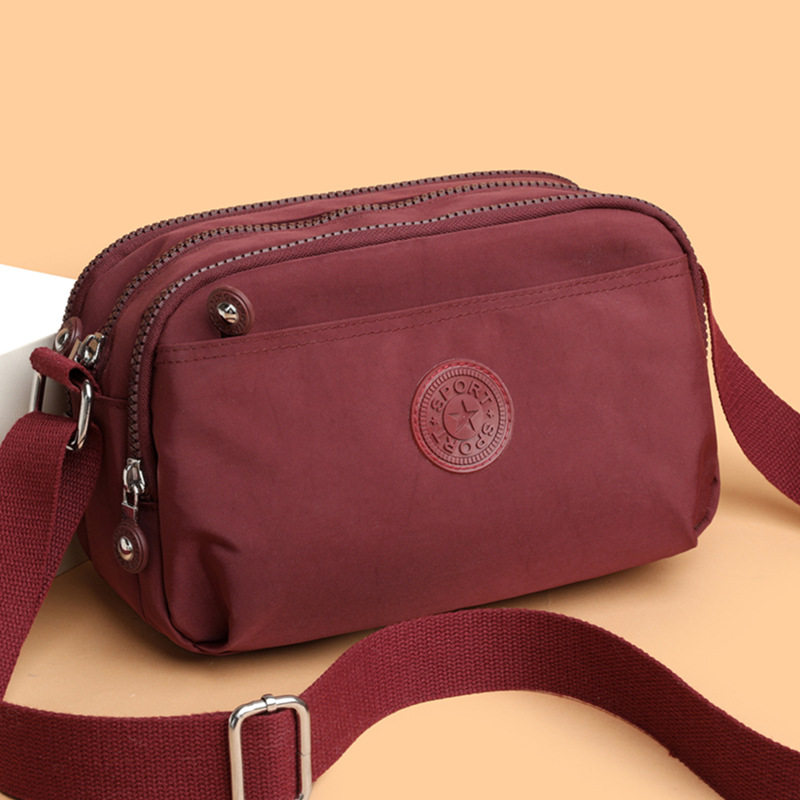 2025新多层斜挎包休闲百搭多口袋便携布包防泼水单肩女包轻便小包,淘宝优惠券,粉丝福利购,淘宝优惠卷