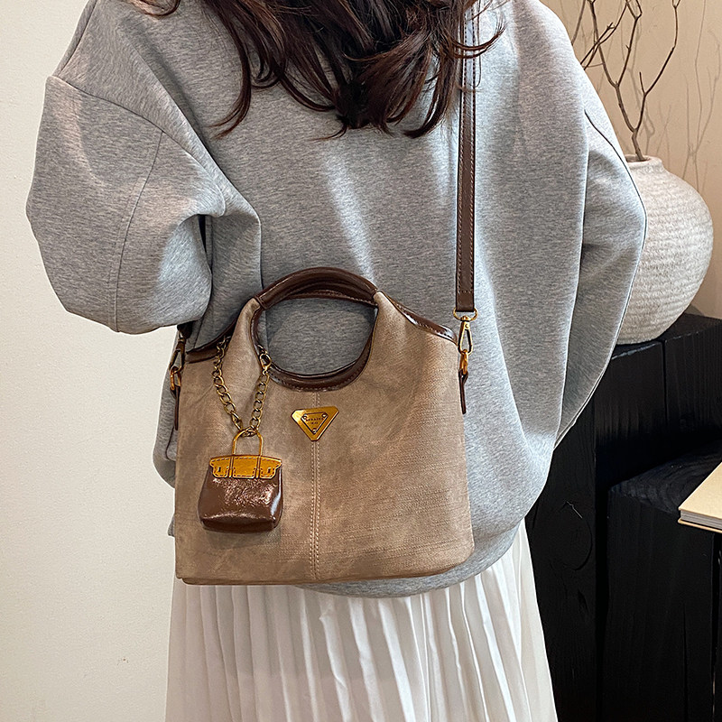 手提菜篮子水桶包包女2025新款高端大气轻奢小众高级感通勤斜挎包,淘宝优惠券,粉丝福利购,淘宝优惠卷