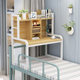 Extended desk on bed in college dormitory