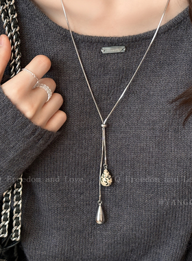虎眼石水滴抽拉项链女2025新款轻奢小众设计感配饰秋冬长款毛衣链