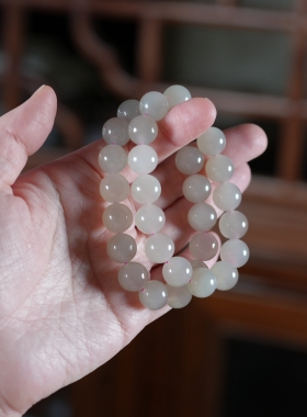 一枕荷香带雨中。冰胶底藕粉和田玉12毫米起荧光圆珠手链串女