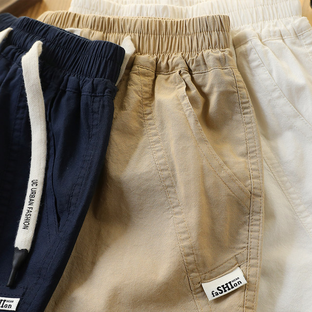 ເດັກຊາຍ's style workwear ໃສ່ກິລາຝ້າຍບໍລິສຸດສັ້ນສັ້ນບາງ