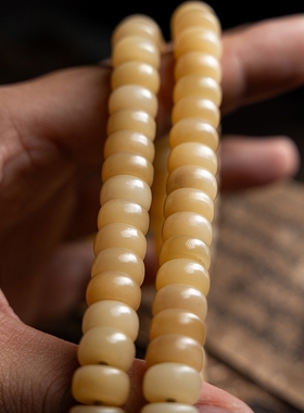 卡杰格朵.驼骨玉化黄料念珠