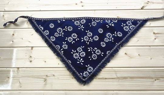 Square dance performance by tea-picking girls in ethnic headscarves