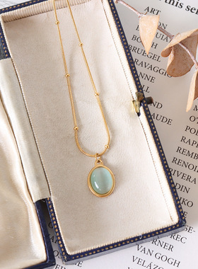 复古钛钢镀猫眼石椭圆吊坠项链