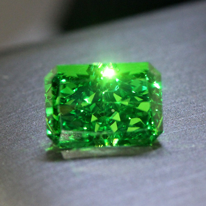 Ice cut tsavorite loose stone rectangular radiant emerald