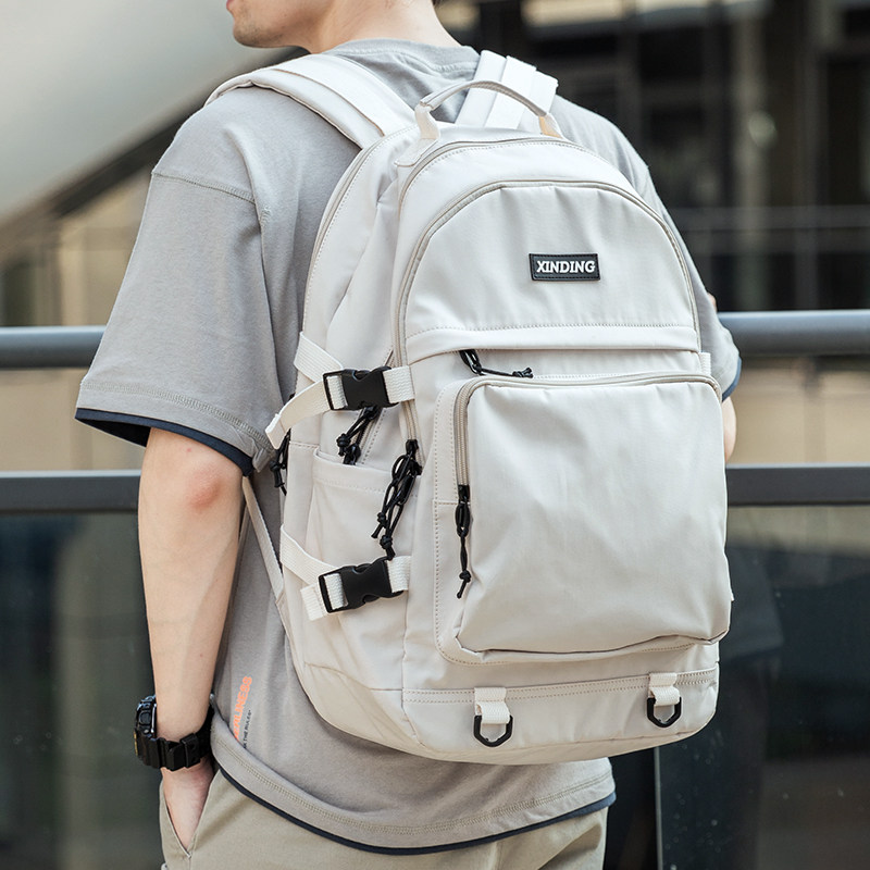 轻便大容量潮流休闲初中旅行包 墨一双肩背包