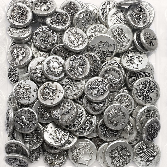 Ancient Greek retro coins are thickened to enhance the three-dimensional effect