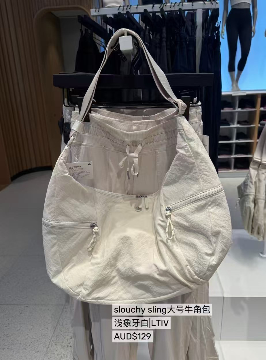 澳洲Lululemon Shoulder Bag新款女黑色小/大号13L牛角包肩带斜挎,淘宝优惠券,粉丝福利购,淘宝优惠卷