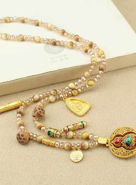 新中式国风仿金虎眼长款项链女复古可转动吊坠毛衣链民族风配饰品