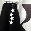 Street trendy people wear trousers and waist pendants