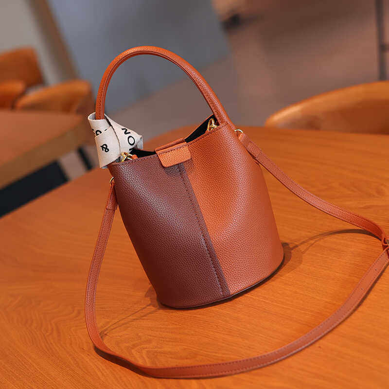 【MUEKA/茉妮卡】今年流行复古小众手提水桶包高级感单肩斜挎女包,淘宝优惠券,粉丝福利购,淘宝优惠卷