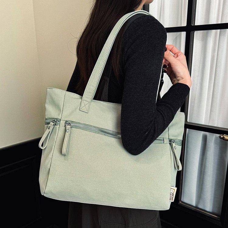 潮流简约大容量女通勤包托特包2026春季新款通用款女包单肩手提包,淘宝优惠券,粉丝福利购,淘宝优惠卷