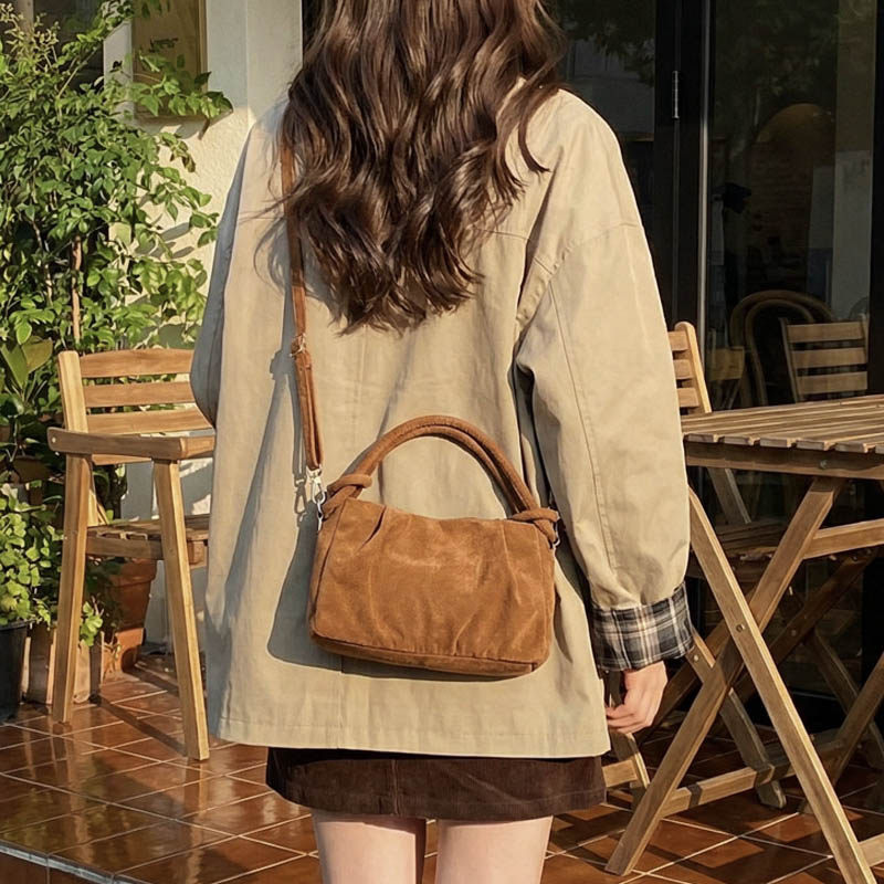 今年流行麂皮绒通勤包包女2025秋冬新款小众复古单肩包休闲斜挎包,淘宝优惠券,粉丝福利购,淘宝优惠卷