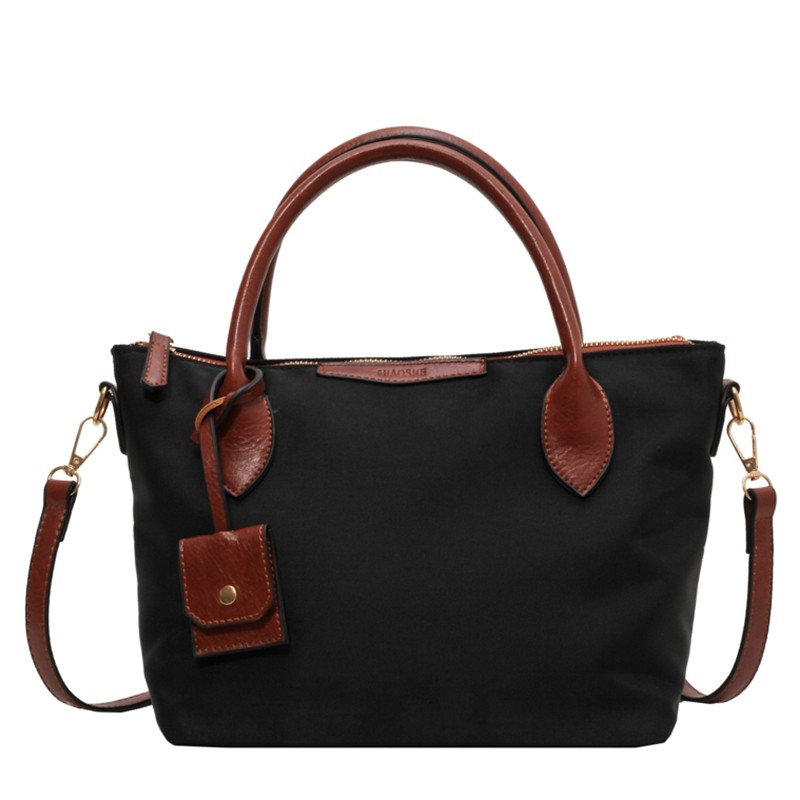 大容量上班通勤托特包包女士2025新款休闲斜挎大包手提牛津帆布包,淘宝优惠券,粉丝福利购,淘宝优惠卷