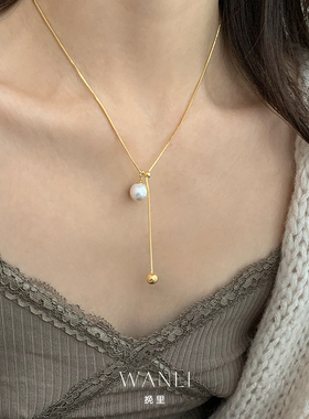 挽里2026新施家白珍珠Y字抽拉虎眼石高级感轻奢小众毛衣链配饰女