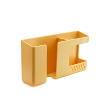 Желтый мобильный телефон, расческа, зубная щетка, коробка для хранения, дистанционное управление