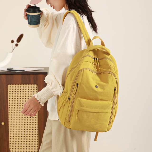 Backpack Women's 2026 New Lightweight Student Multi-Pocket School Bag Business Commuting Short Trip Minimalist Backpack