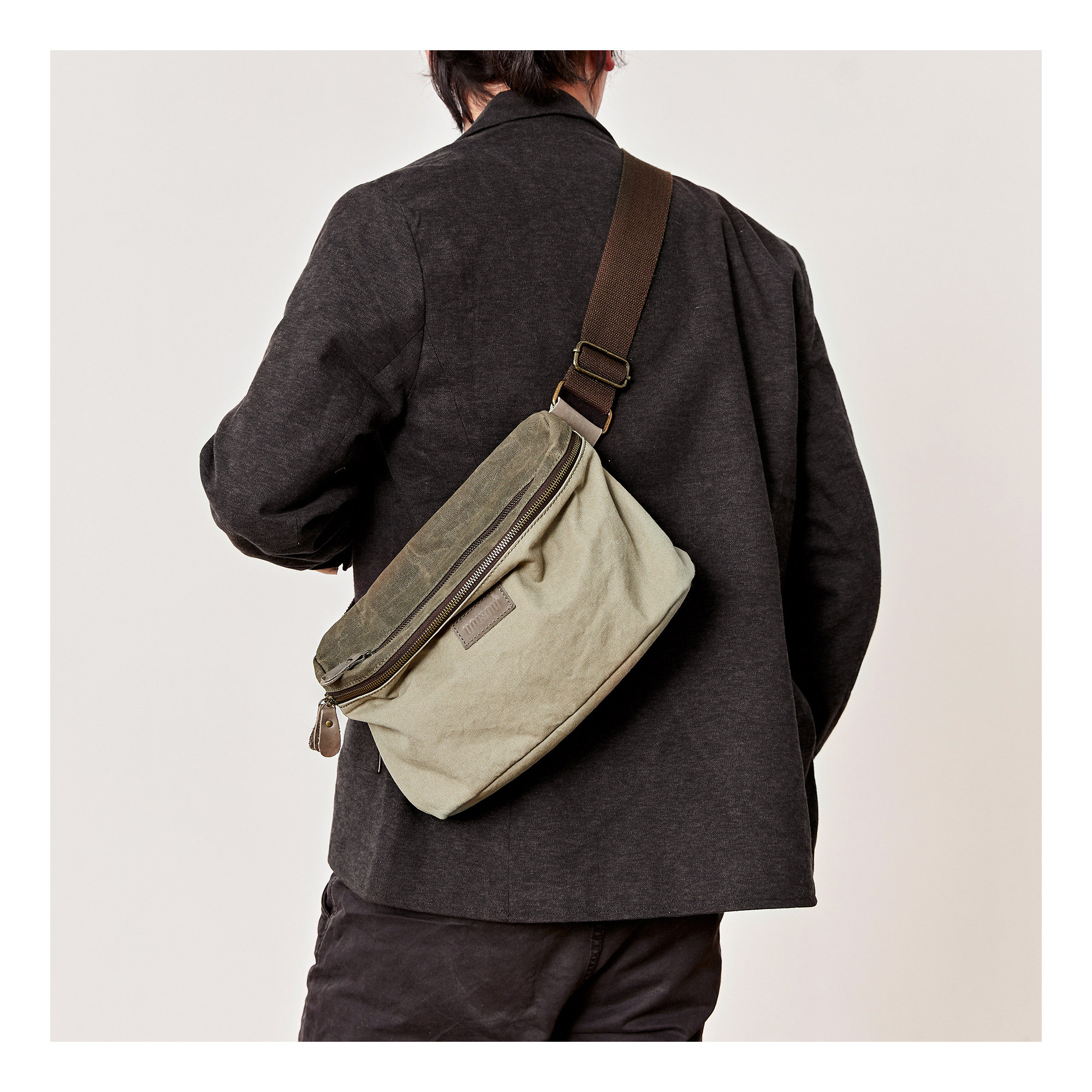 男帆布潮牌休闲小背包新款斜挎包 UNISOUL男士包袋