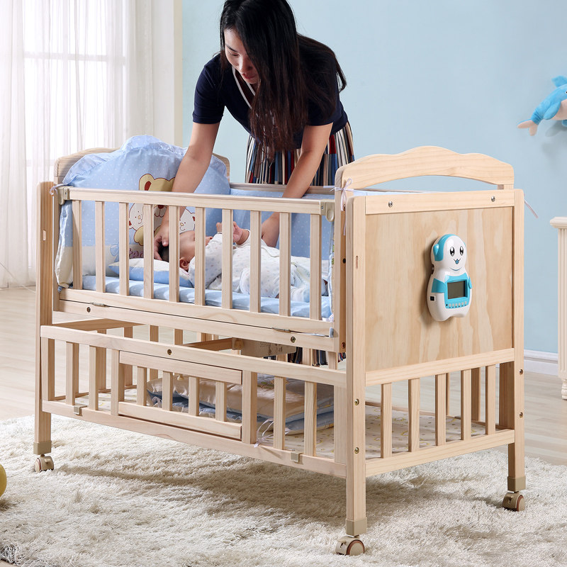 newborn baby wooden bed