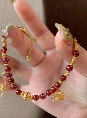 新春天然红石榴石串珠手链女小众扎吉拉姆手串本命年红色古法金女