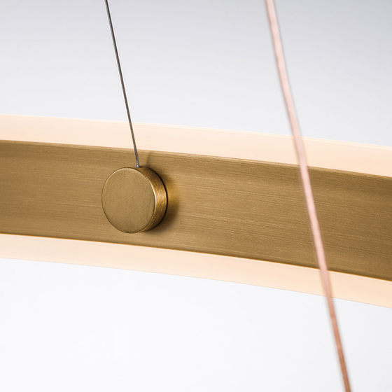 Centric C-shaped opening design surrounds the light