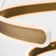 Centric C-shaped opening design surrounds the light