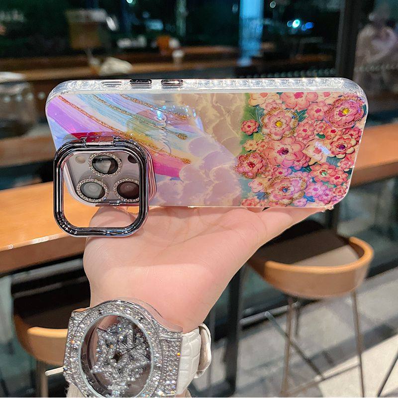 适用苹果系列iPhone16ins风小众新款手机壳15promax大孔支架镜框升级款14pro/13pro油画彩虹花海女款保护套