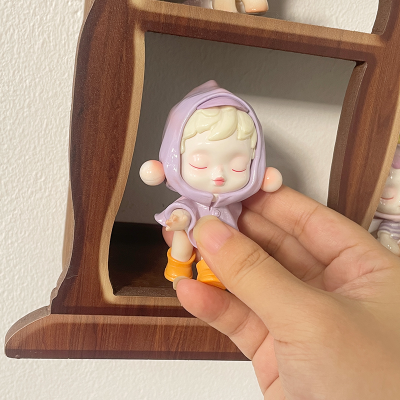 Creative blind box figure storage box with clock display stand