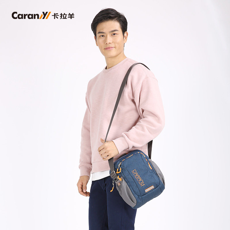 新款卡拉羊户外运动包休闲潮帆布包 梦之旅箱包男士包袋