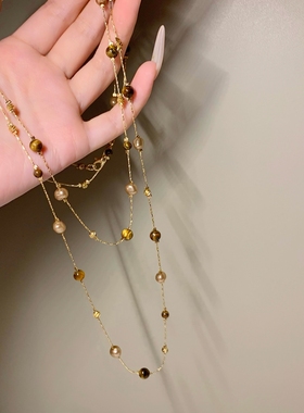 美拉德虎眼石珍珠项链女秋冬季2025爆款百搭轻奢高级感长款毛衣链