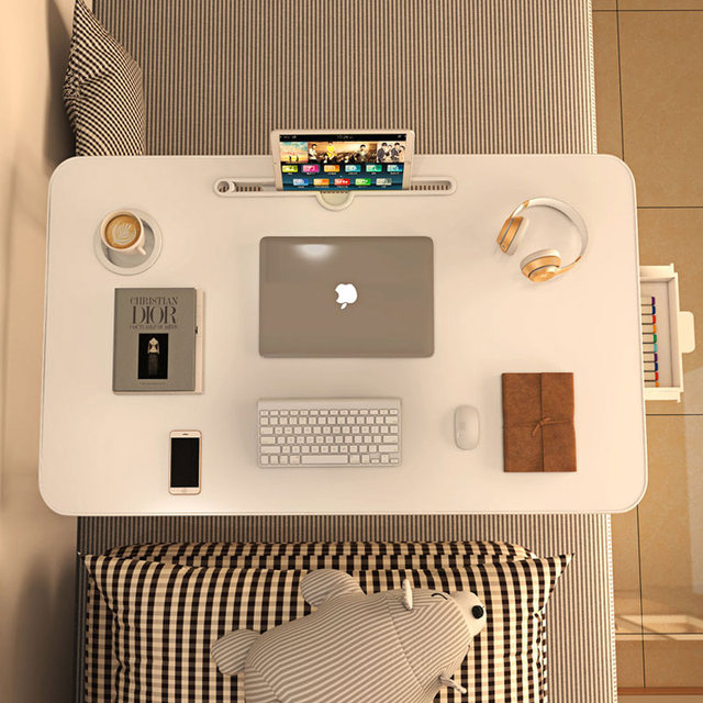 Small table on the study bed in college dormitory