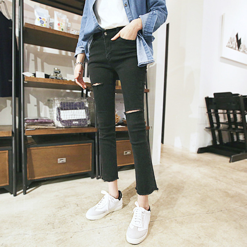 不规则黑色个性破洞高腰潮9牛仔裤 冰雪丹尼牛仔裤