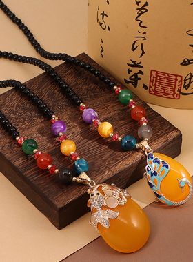 中国风水滴金鱼蜜蜡毛衣链长款