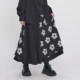 Yinmi ກາງ-ຍາວ skirt ວ່າງ A-line ສີເຂັ້ມ