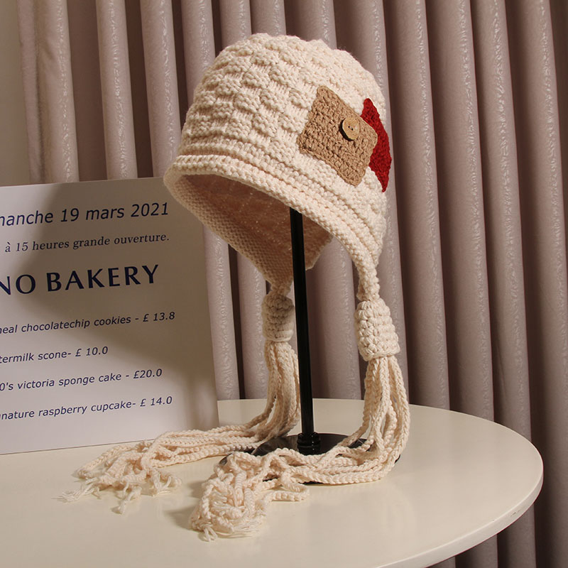 韩版流苏时尚潮流雷锋帽女秋冬保暖手工针织毛线帽百搭套头护耳帽,淘宝优惠券,粉丝福利购,淘宝优惠卷