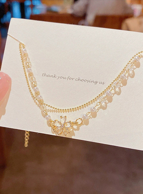 ins潮钛钢双层珍珠手链女超闪精致锆石花朵吊坠手串韩国新款手饰