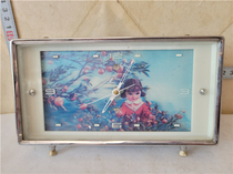 Old alarm clock taunted with female dolls second hand