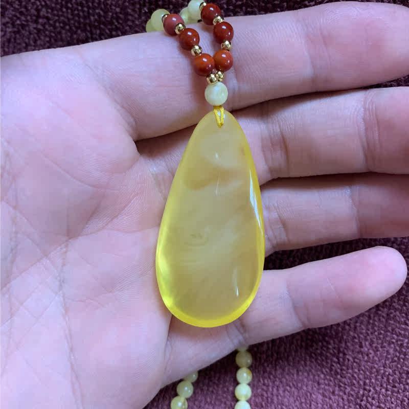 元辰宫天然蜜蜡水滴鸡油黄毛衣链 元辰宫项链
