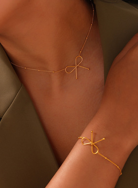 韩式清新甜美蝴蝶结饰品女简约小众夹珠链设计感钛钢首饰套装