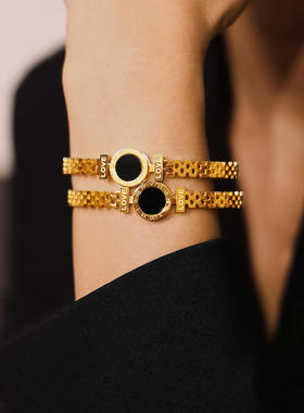 欧美时尚罗马数字黑亚克力表盘镂空仿表带设计钛钢镀金轻奢手镯女