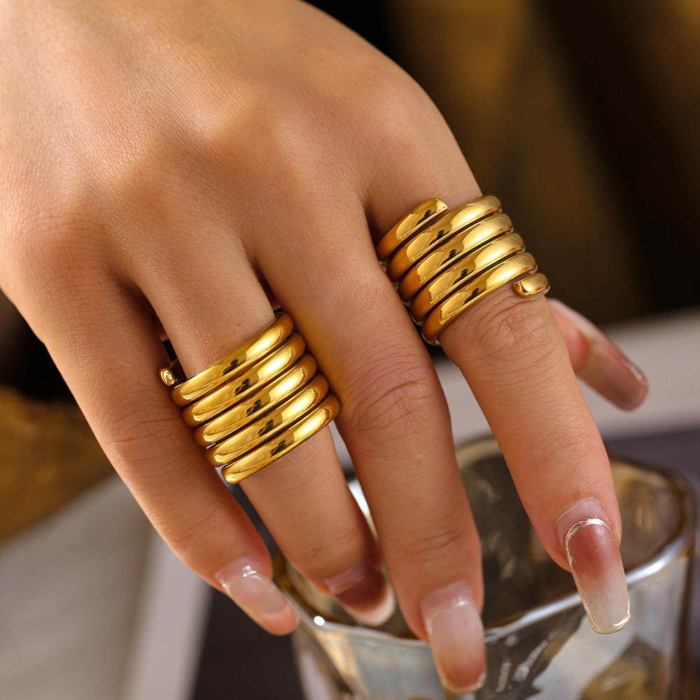 Cross-border European and American niche design multi-layer winding wide version ring for women with light luxury texture titanium steel plated 18k gold ring
